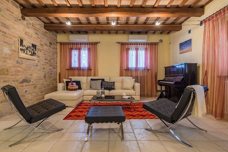 Villa Design - Wohnzimmer mit Klavier