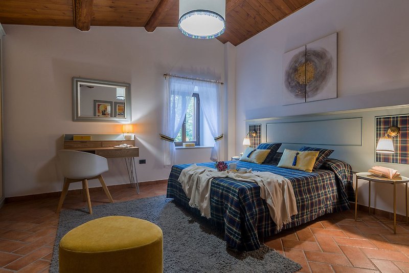 Villa Durante – Schlafzimmer mit Doppelbett und Einzelbett
