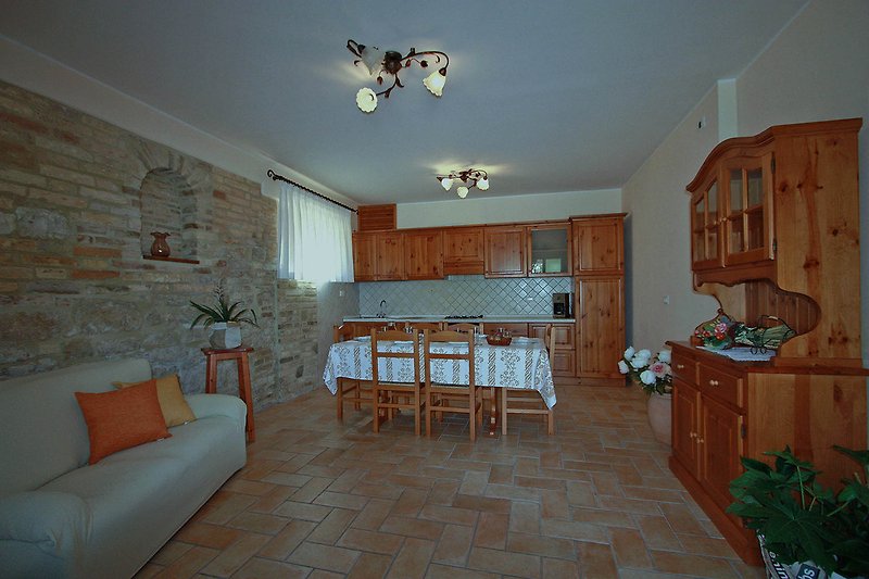 Casale Lucy - Kitchen with dining area and sofa bed
