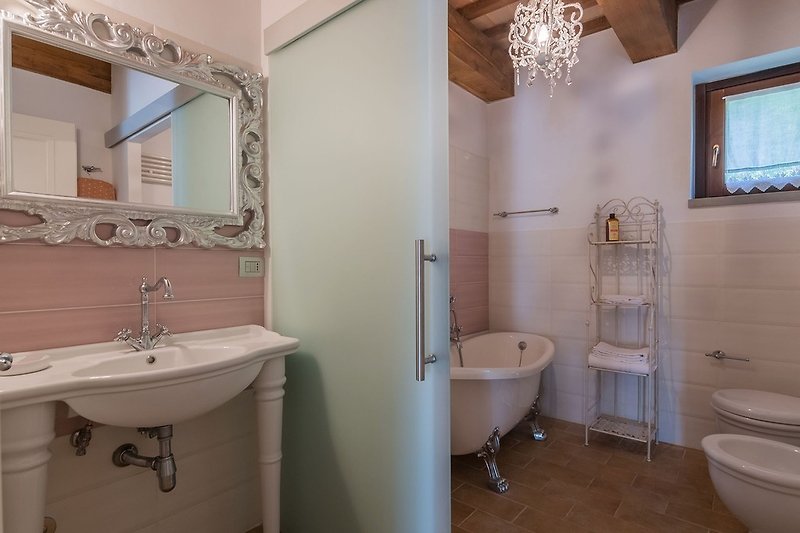 Villa Petra - elegant bathroom with tub