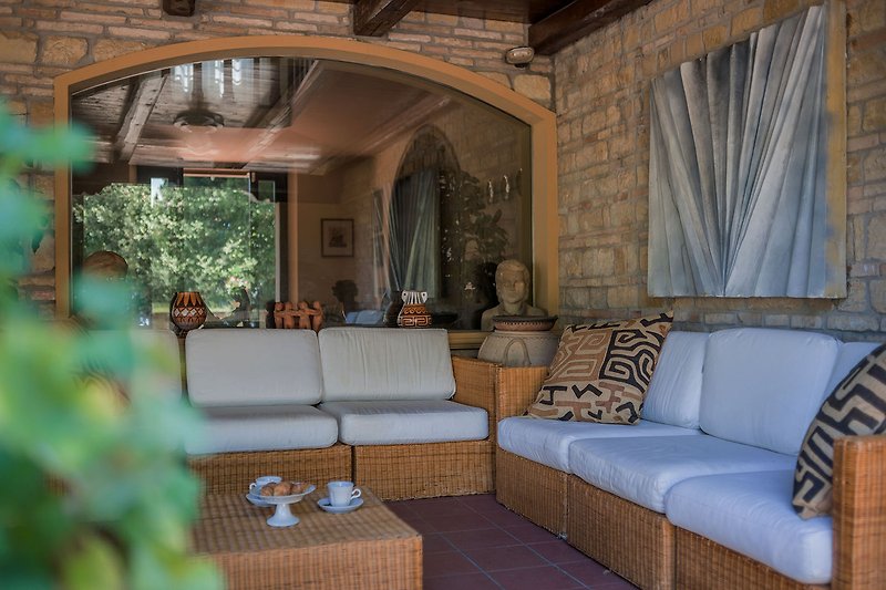 Villa Nina – Entspannungsbereich unter der Veranda