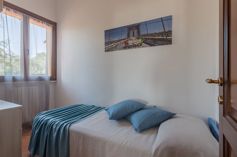 Villa Candelara - Schlafzimmer mit Einzelbett