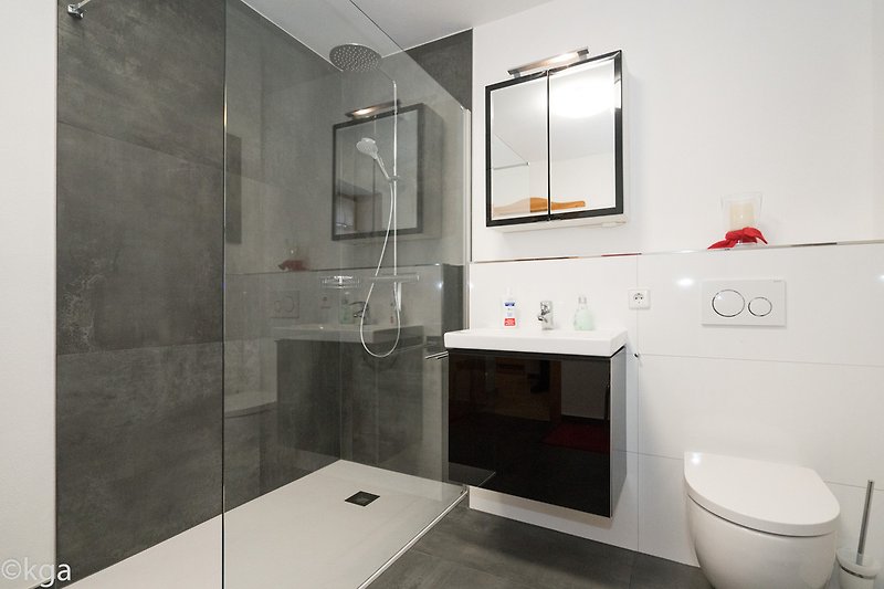 Bathroom with walk in showers