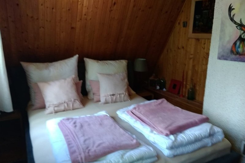 Schlafzimmer mit Waldaussicht 