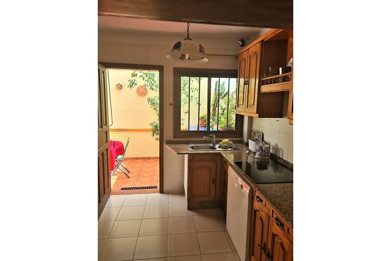 Kitchen with exit to the patio
