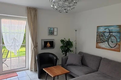 Casa di vacanza con giardino a Neßmersiel