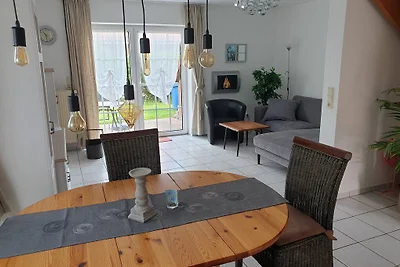 Casa di vacanza con giardino a Neßmersiel