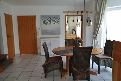 Casa di vacanza con giardino a Neßmersiel