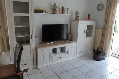 Casa di vacanza con giardino a Neßmersiel