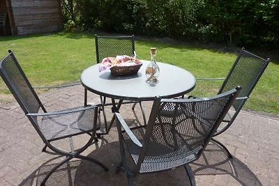 Casa di vacanza con giardino a Neßmersiel