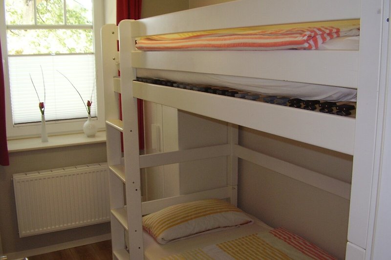 Schlafzimmer mit Etagenbetten