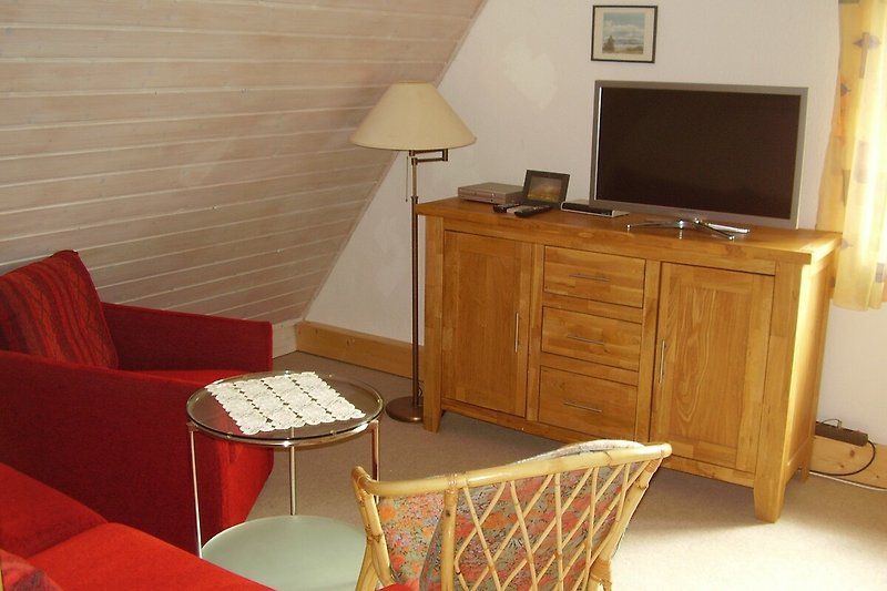 Schlafzimmer 2 oben mit Sitzecke und Flachbild-TV
