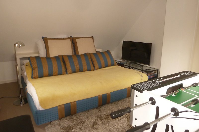 Doppelbett im Extrazimmer (hier als Sofa gestaltet))