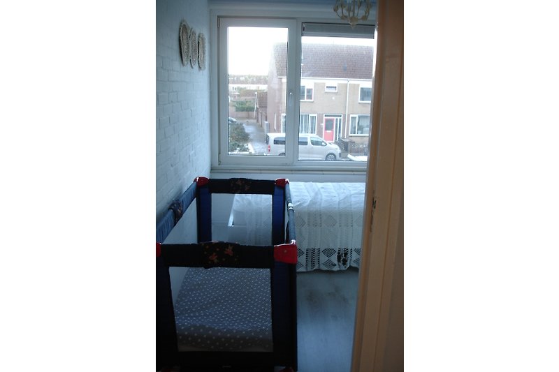 1-Personen-Schlafzimmer mit Möglichkeit für ein Kinderbett