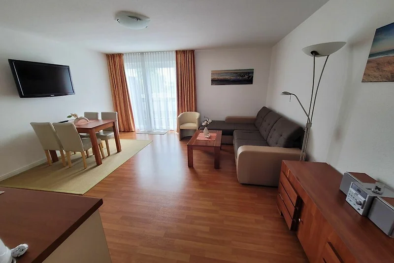 Wohnzimmer mit Schlafsofa