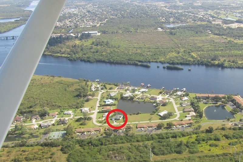 Aerial view of house and surroundings