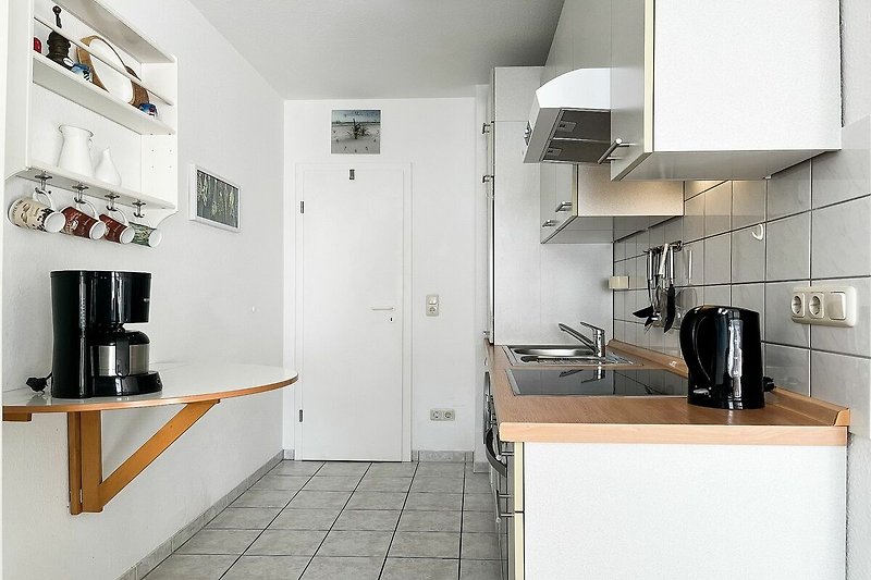 Küchenzeile im Wohnzimmer integriert