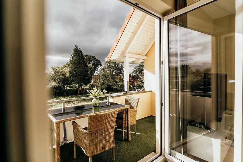 Balkon mit Gartenmöbeln