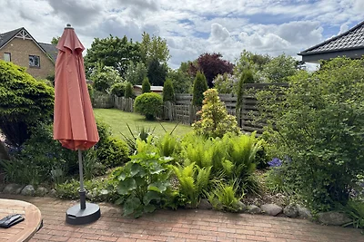 Reetdachhaus LÜTT HUUS mit Garten