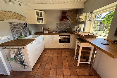 Reetdachhaus LÜTT HUUS mit Garten
