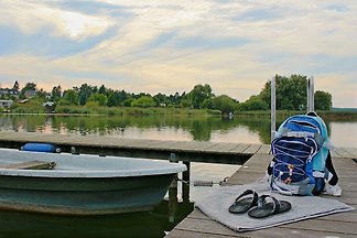 Ferienhaus am Wariner See mit Boot