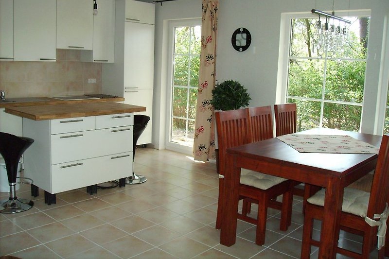 View of dining area and kitchen