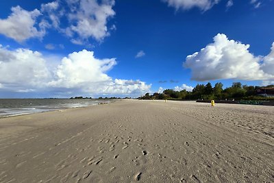 Dijkvilla met uitzicht op het water