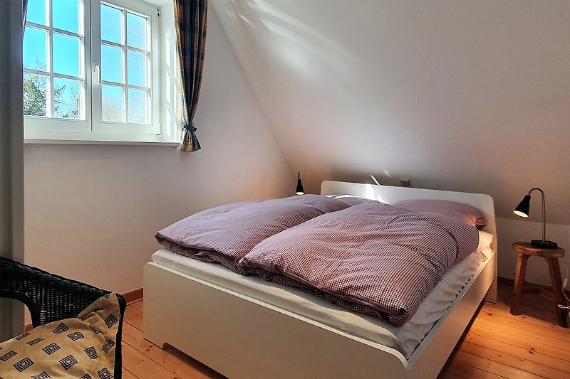 Das zweite Schlafzimmer mit Doppelbett
