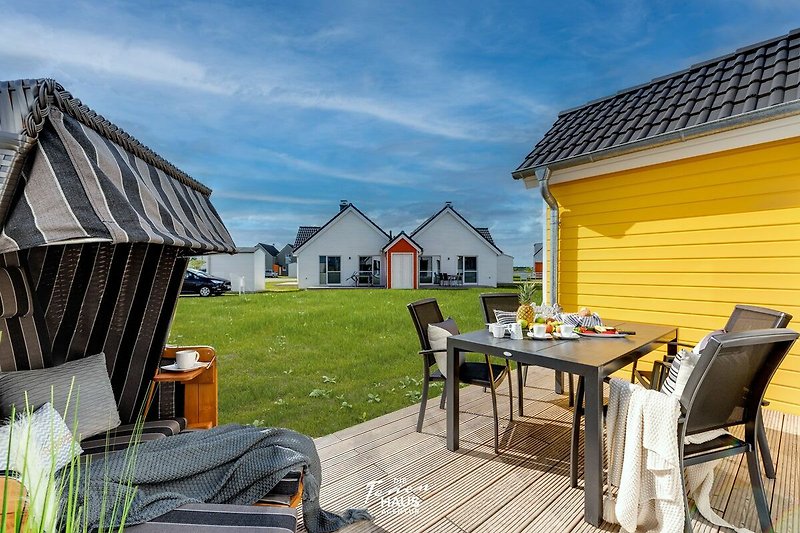 Please translate following text to [nl]: Terrassen sind wichtige Bestandteile von Wohngebäuden und dienen als Erholungsorte im Freien, an denen man die frische Luft und das angenehme Wetter genießen kann. Sie sind oft mit Gartenmöbeln ausgestattet, die es