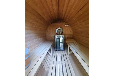 Blockhaus II mit Saunatonne, Kamin, großem eingezäunten Garten, 3 Schlafzimmer