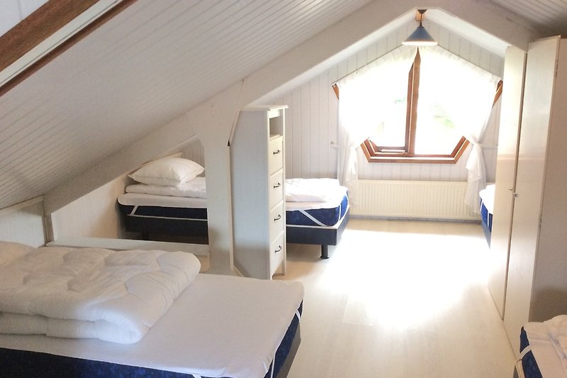Above is a large family bedroom.