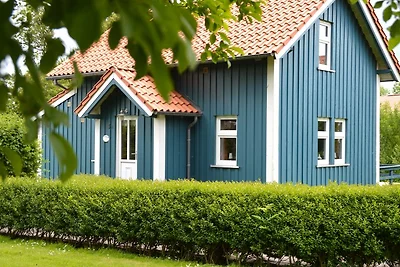 Blaues Sommerhaus am Meer