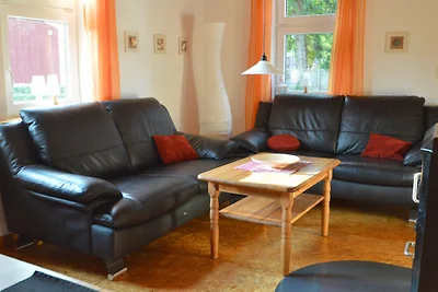 Blaues Sommerhaus am Meer