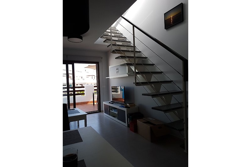 Wohnzimmer- Treppe zur Dachterrasse
