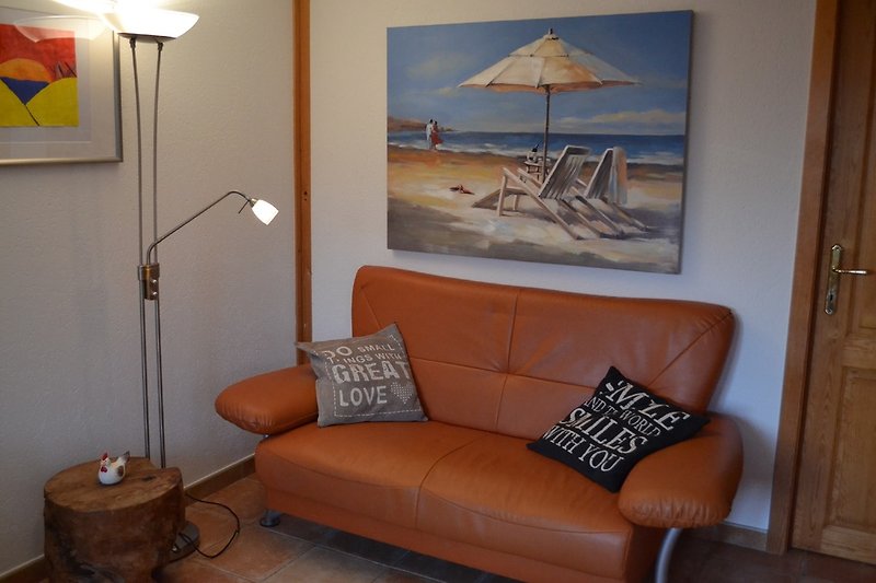 Sofa with ocean picture