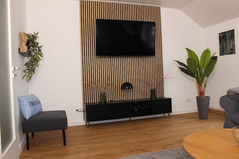 Wohnzimmer mit 55 Zoll (139cm) Fernseher