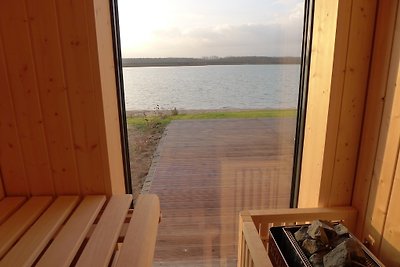 Casa en el lago con playa privada Nórdica