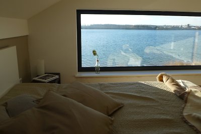 Casa en el lago con playa privada Nórdica