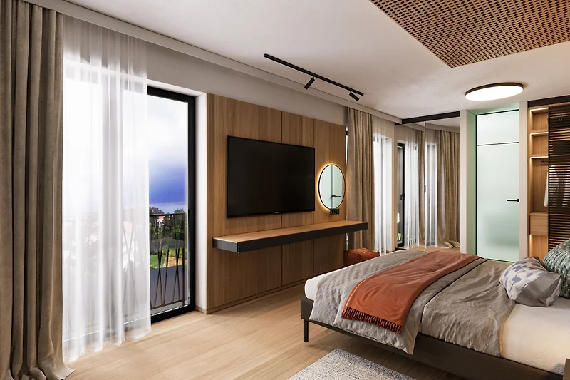Gemütliches Schlafzimmer mit Bett, TV, Lampen und Pflanzen.