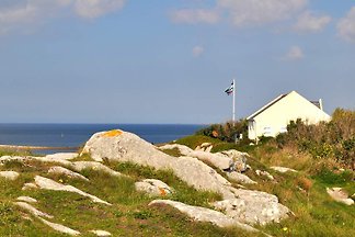 Kleines Fischerhaus auf dem Felsen