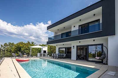 Villa Aris mit beheiztem Pool & Meerblick