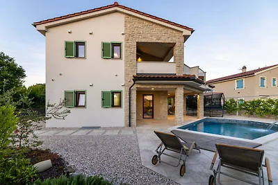 Villa Divina – Küstenvilla mit beheiztem Pool und Ladestation für Elektrofahrzeuge