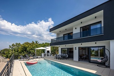 Villa Aris mit beheiztem Pool & Meerblick