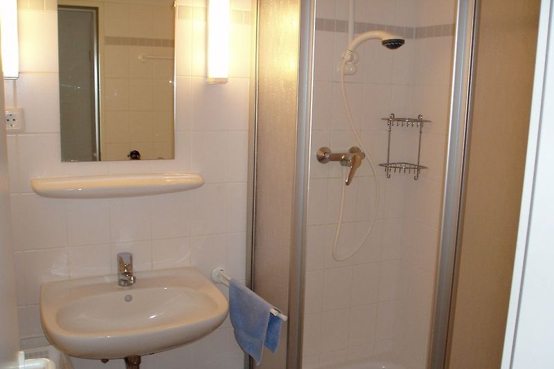 Bathroom with shower + toilet