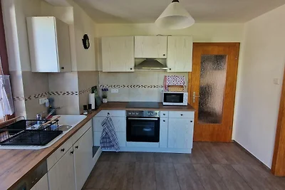 Ferienwohnung im Erdgeschoss mit Garten für 2...