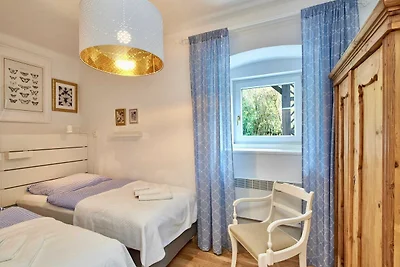 Landhaus Dodo - Garten Apartment mit einem SZ...