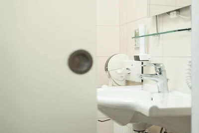 Panoramazimmer mit Wintergarten