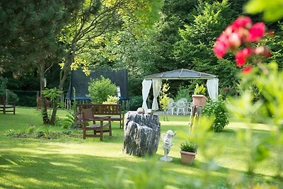 Panoramazimmer mit Wintergarten