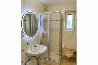 Küstenwald - Ferienwohnung Seeigel