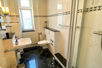 Ferienwohnung mit Balkon in Bäderstilvilla